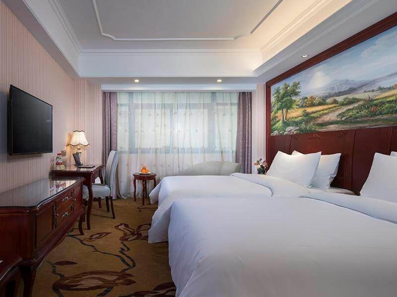 Vienna International Hotel Fenghua Zhongshan Road Екстериор снимка