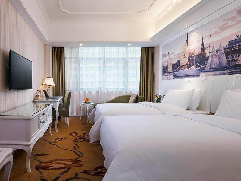 Vienna International Hotel Fenghua Zhongshan Road Екстериор снимка