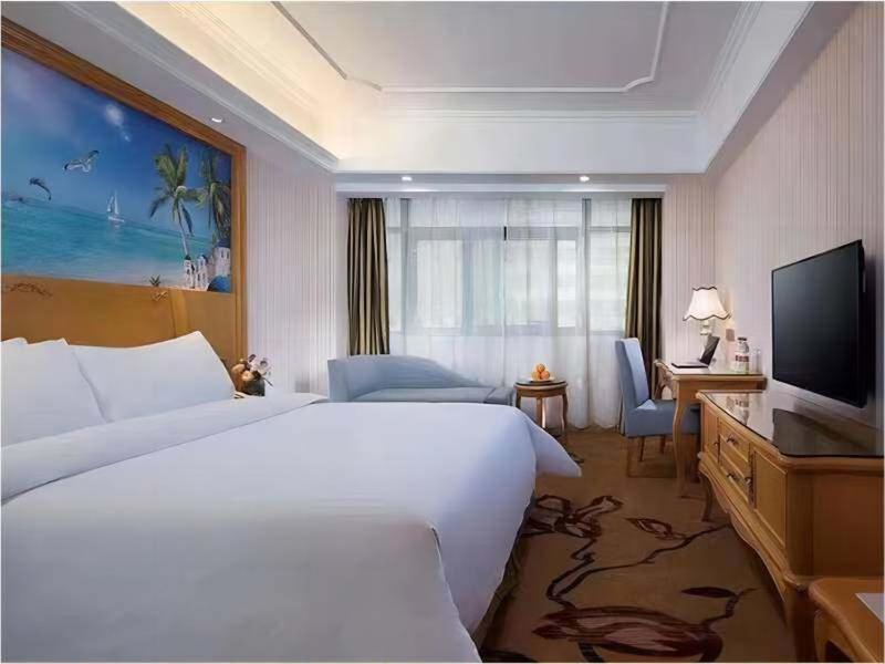 Vienna International Hotel Fenghua Zhongshan Road Екстериор снимка