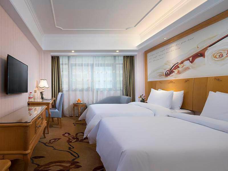 Vienna International Hotel Fenghua Zhongshan Road Екстериор снимка