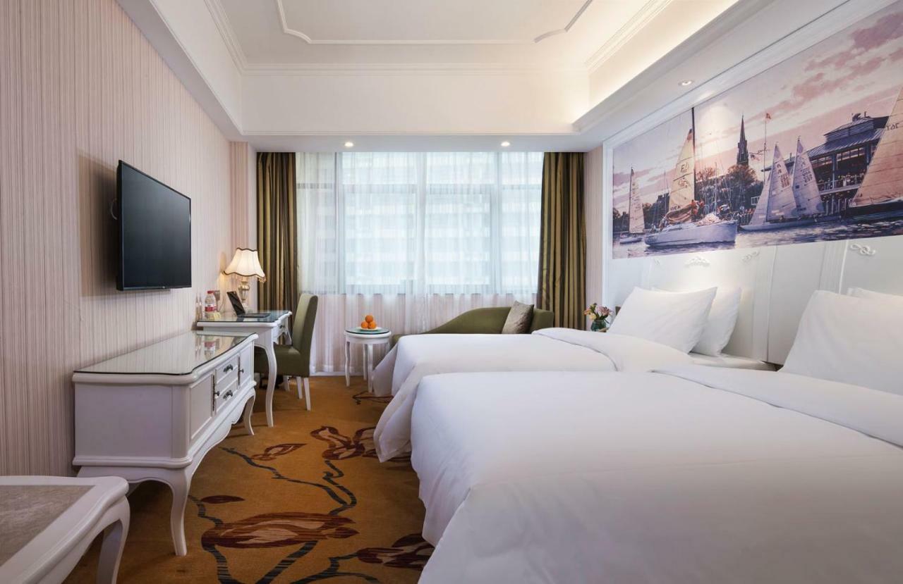 Vienna International Hotel Fenghua Zhongshan Road Екстериор снимка